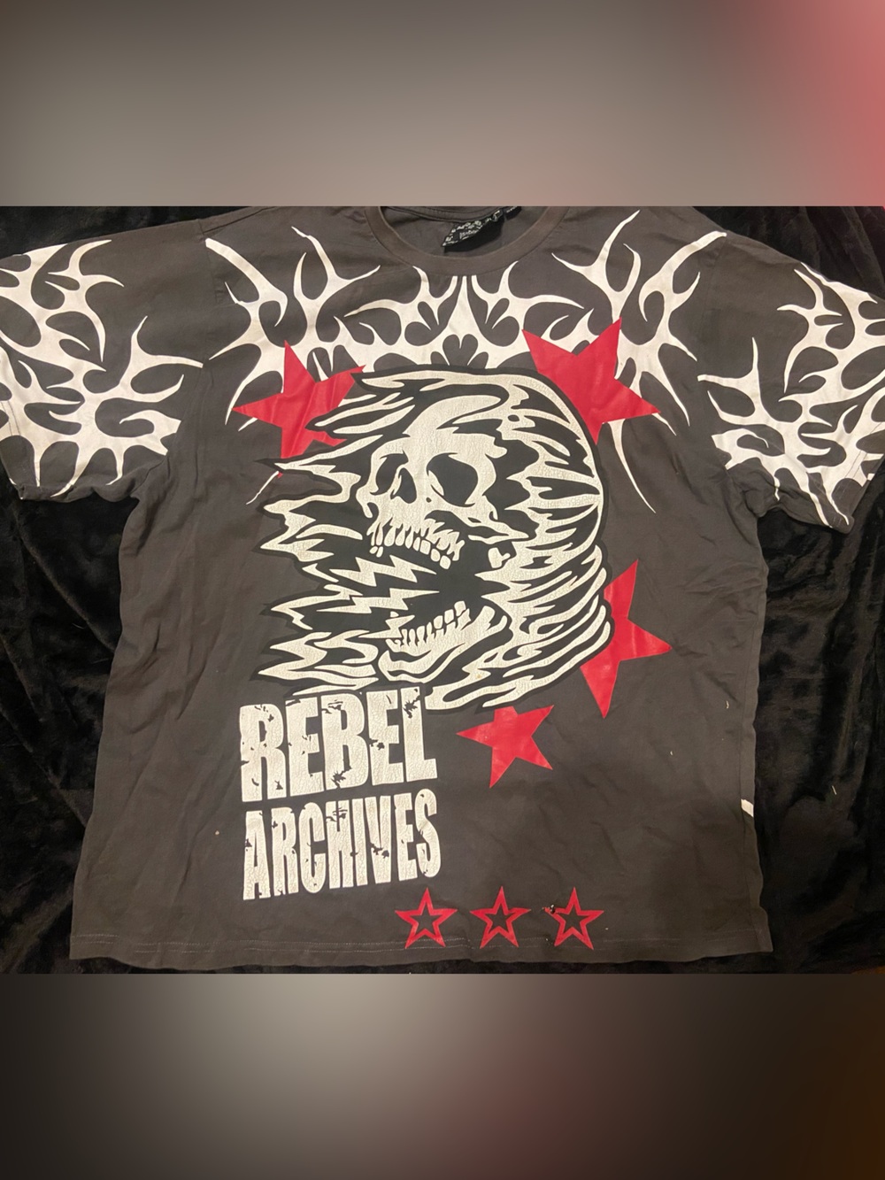 Rebellion Black Tee with White Skull Graphic and Red Star Accents